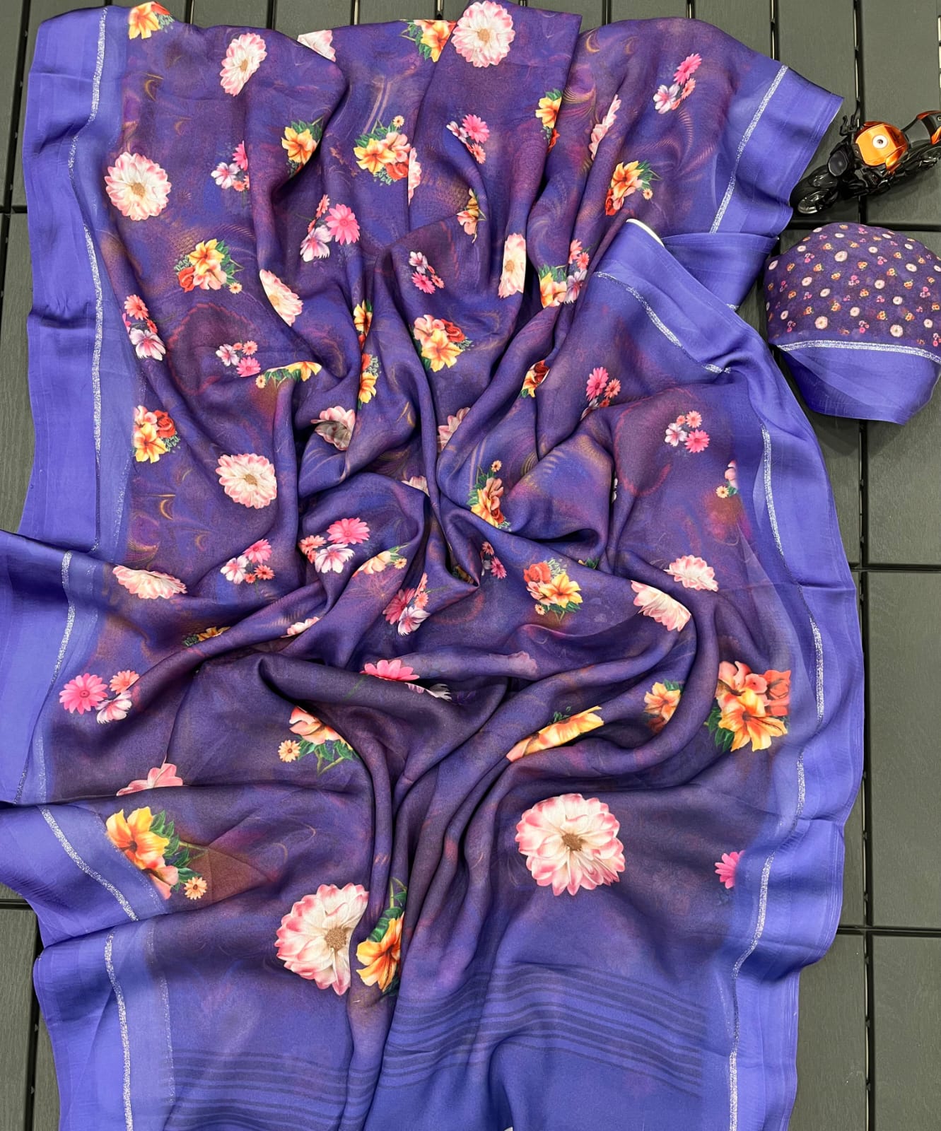 Jorgette silk Premium Georgette in purple color with Floral print striped pallu Self colour printed blouse