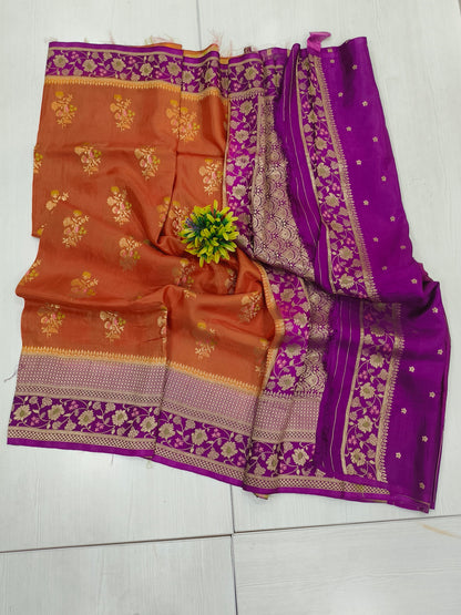 Mango silk designer saree in Rustie orange with contrast floral border and pallu and blouse