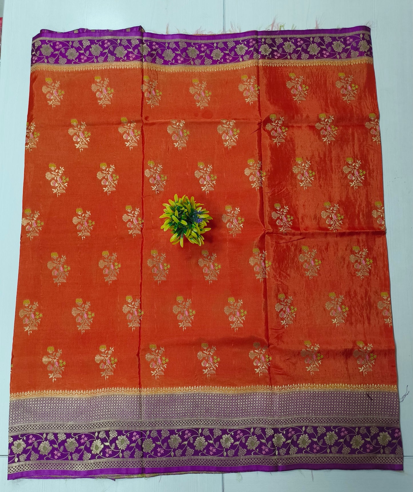 Mango silk designer saree in Rustie orange with contrast floral border and pallu and blouse