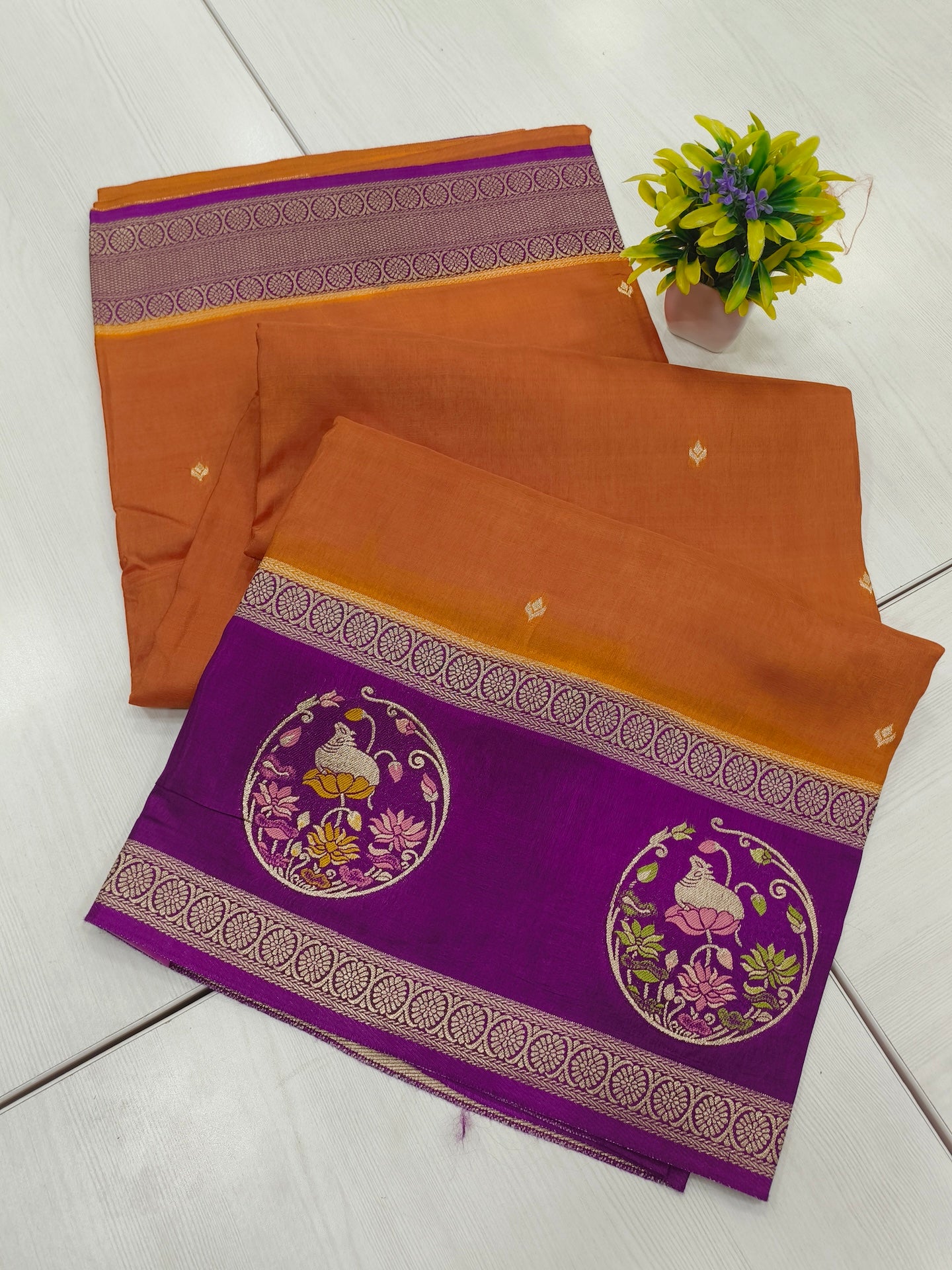 Mango silk designer saree in Rustie orange with contrast pichwai border and pallu and blouse