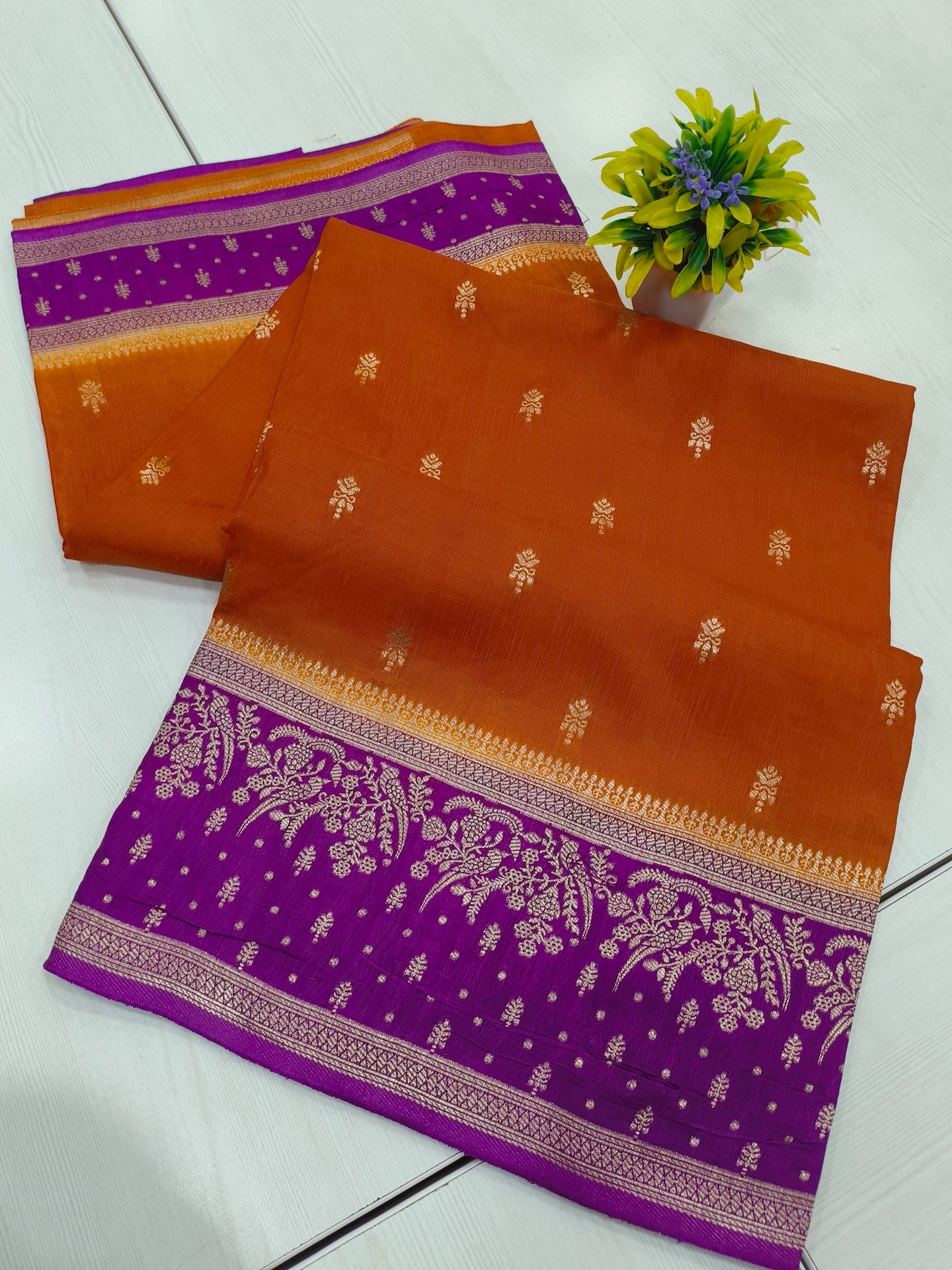 Rustie orangeMango silk designer saree with contrast border and pallu and blouse