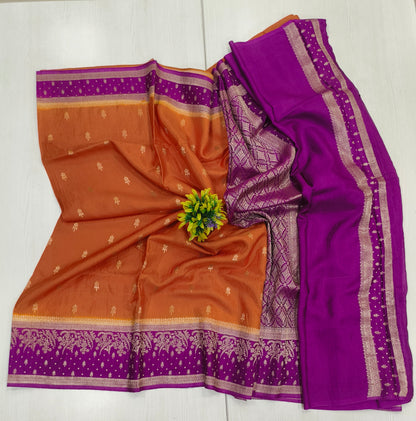Rustie orangeMango silk designer saree with contrast border and pallu and blouse