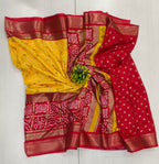 Yellow Red Semi Dola Silk With Bandhini Print And Foil Print Contrast Border And Rich Pallu Printed Blouse With Border