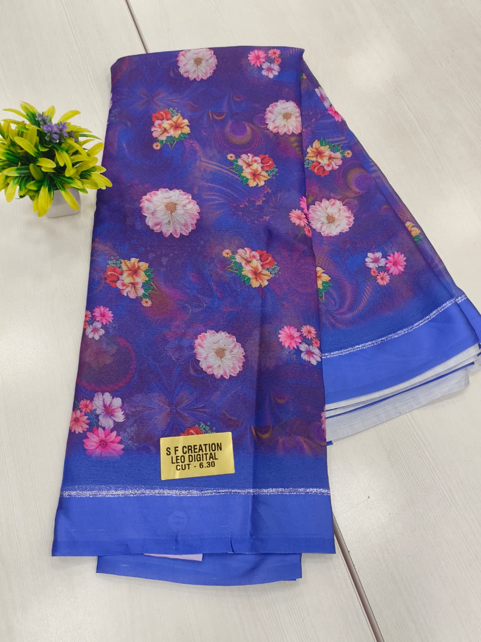 Jorgette silk Premium Georgette in purple color with Floral print striped pallu Self colour printed blouse