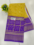 Yellow & Purple Semi Dola Silk Bandhini Saree With Foil Print Border