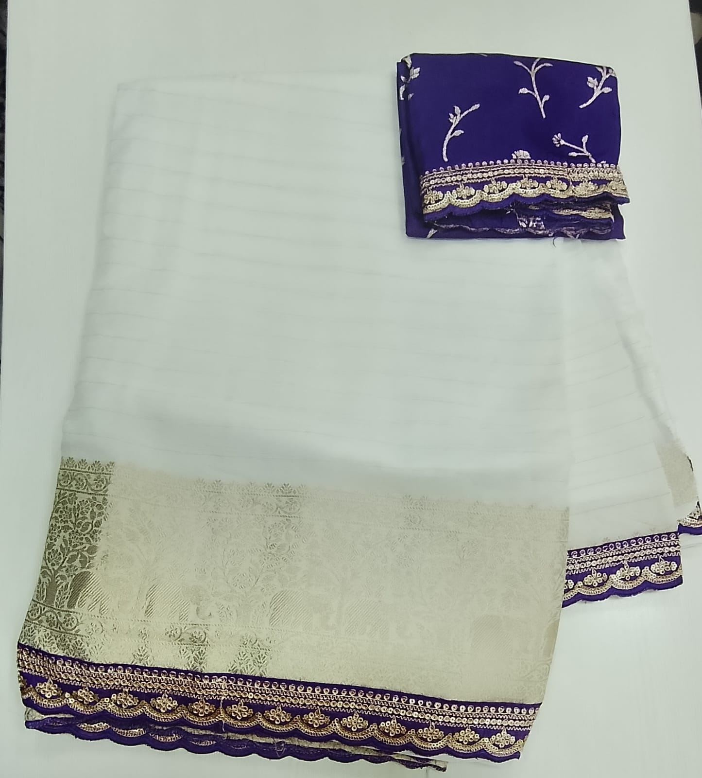 banaras saree with a contrast blouse